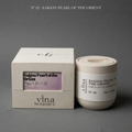 Vina Botanics Saigon Pearl of the Orient candle and packaging on a gray background