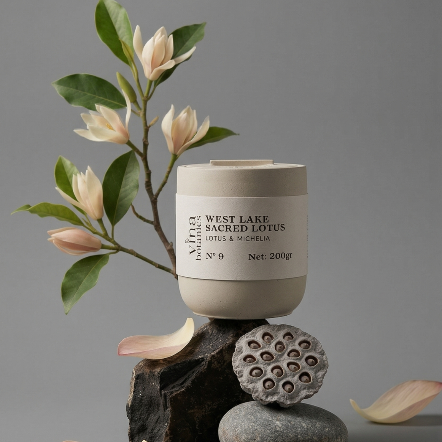 Candle with 'West Lake Sacred Lotus' label on a gray background