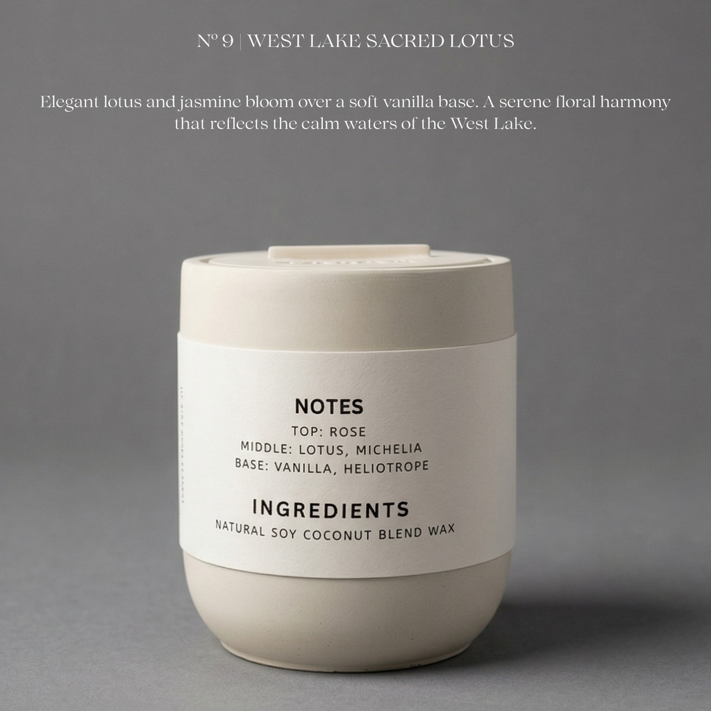 Candle labeled 'West Lake Sacred Lotus' with description and ingredients on a gray background
