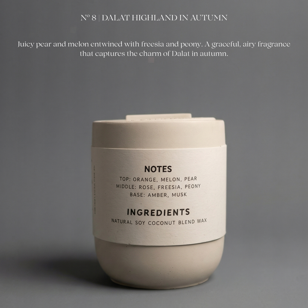 Candle with label on a gray background