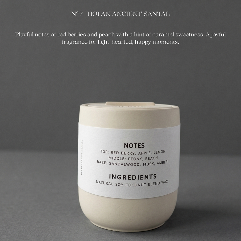 Candle with a label on a gray background