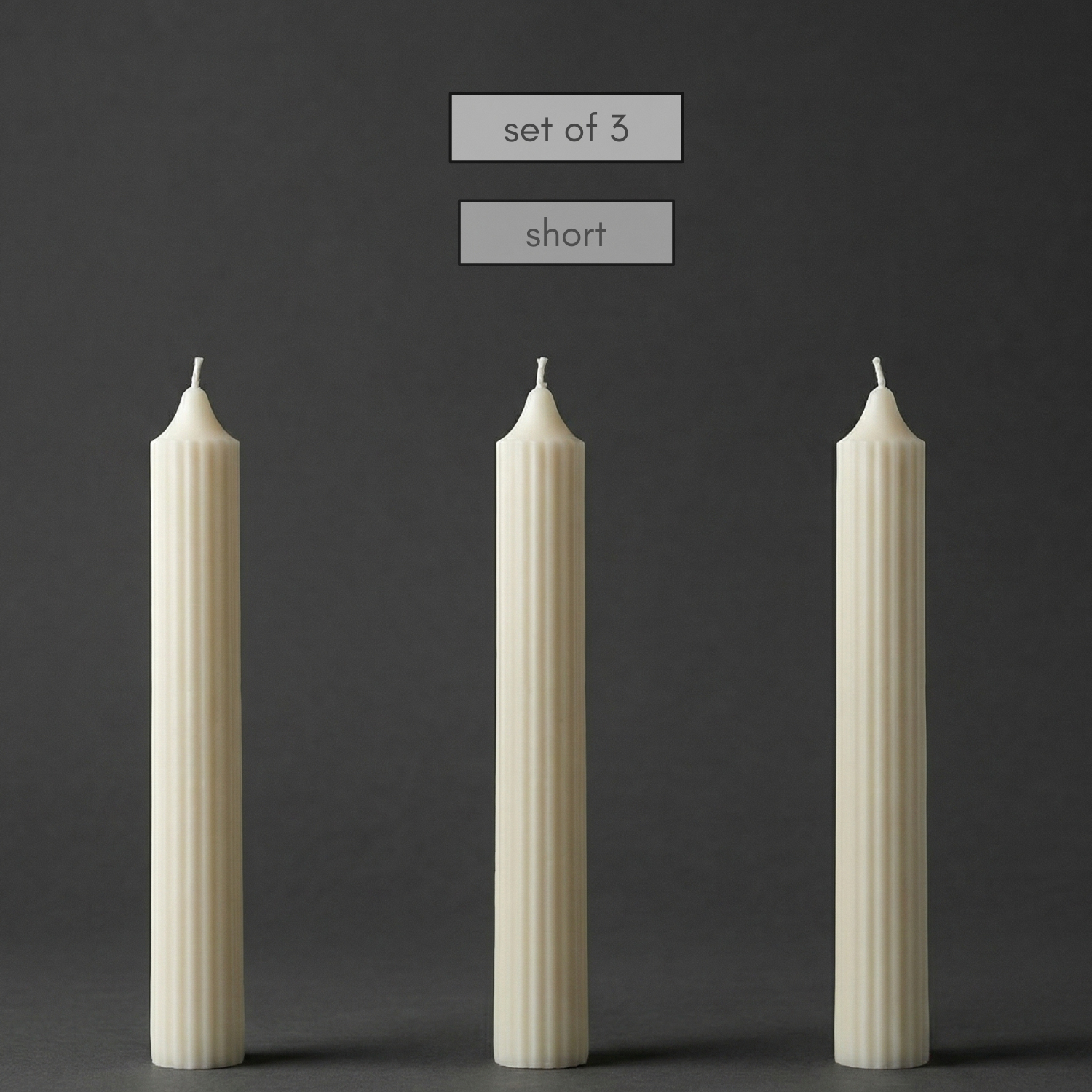 Three small white candles on a dark background with text indicating 'set of 3' and 'small size'.