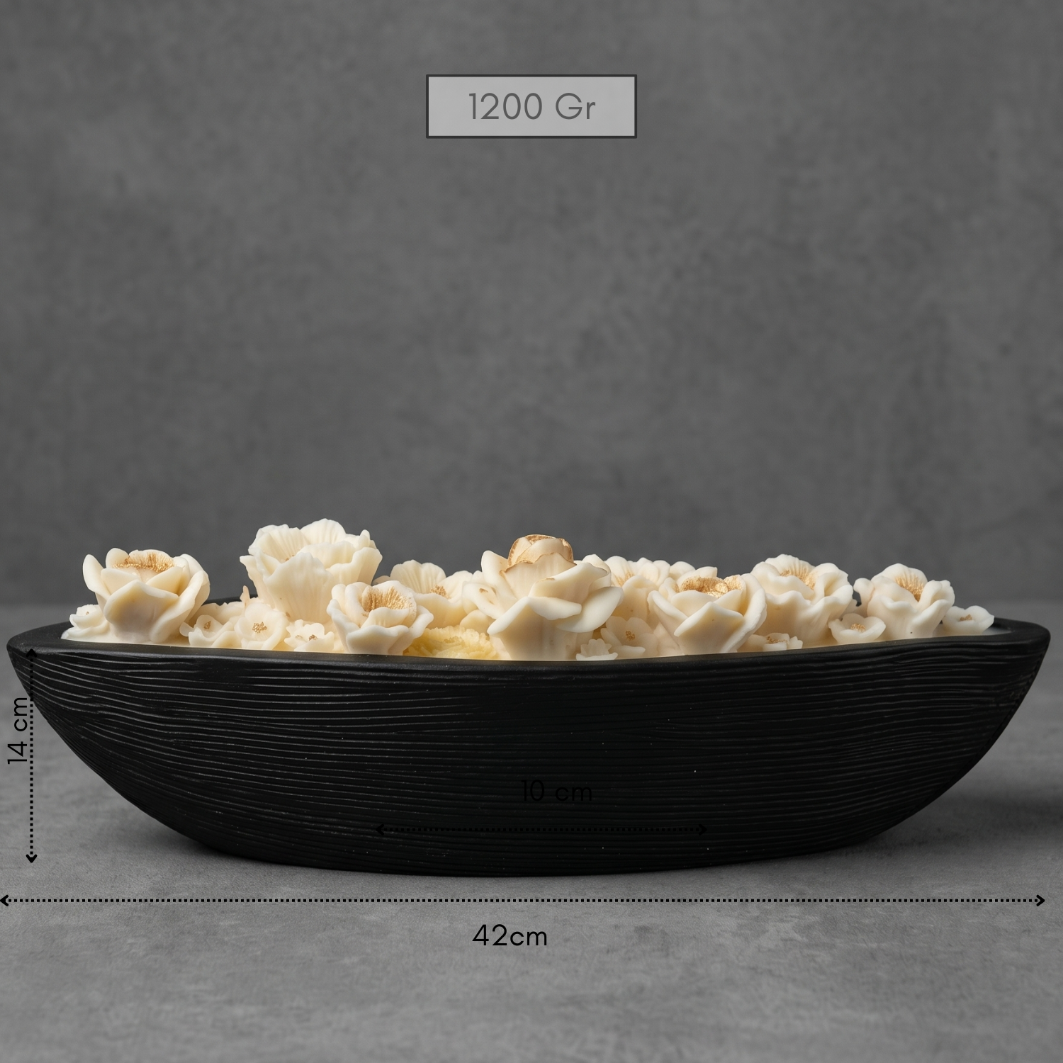 Black bowl with popcorn on a gray background, showing measurements.
